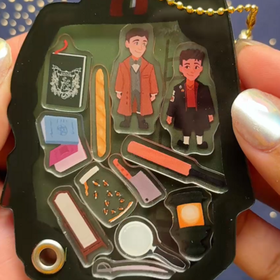 Charles backpack shaker charm