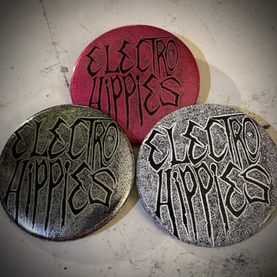 Electro hippies pin badge