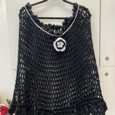 Black crocheted poncho