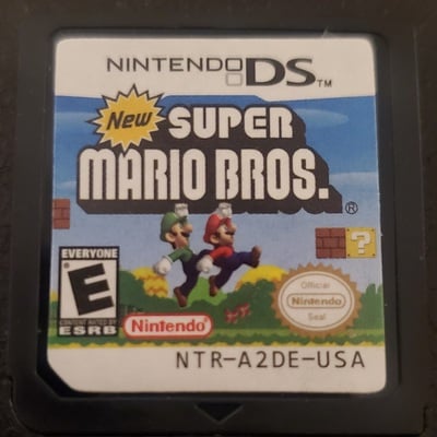 New super mario bros nintendo ds video game cartridge