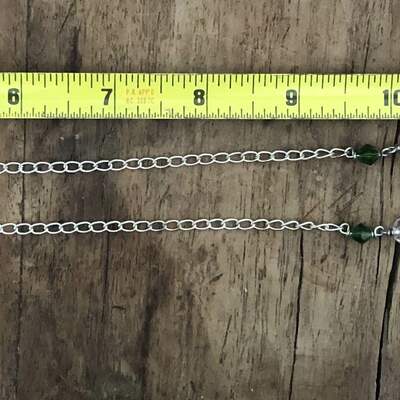 Green bow gingerbread man necklace