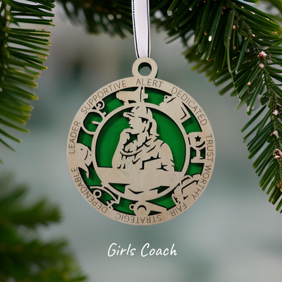 #282 female coach christmas ornament
