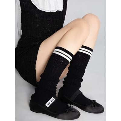 Pointelle flared leg warmers