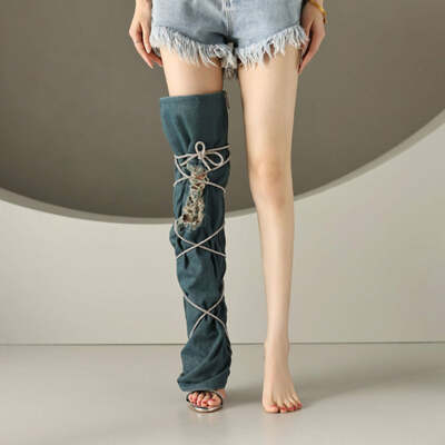 Rhinestone-studded cowboy distressed cross-laced stiletto boots