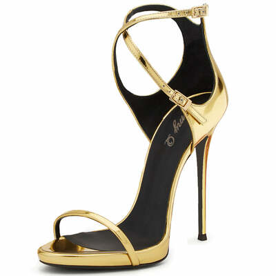 Golden patent leather clutch with cross-strap high heeled sandals