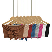 Slim-fitting top with bow tie at chest - Thumbnail 1