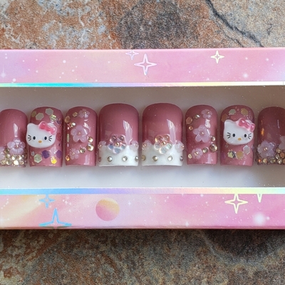 Hello kitty love 😻 💕 non-toxic nail polish press-ons by nubian collection artwear 👑