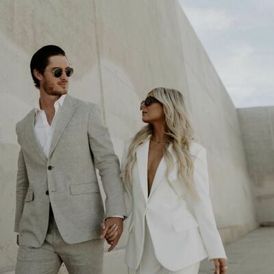 Modern bride, white wedding suit