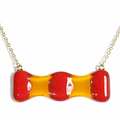 Red on amber fused glass bar necklace