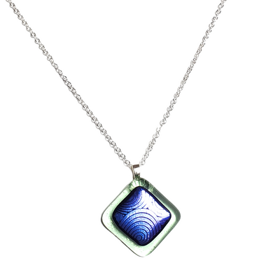 Dichroic blue circles on transparent green fused glass pendant necklace