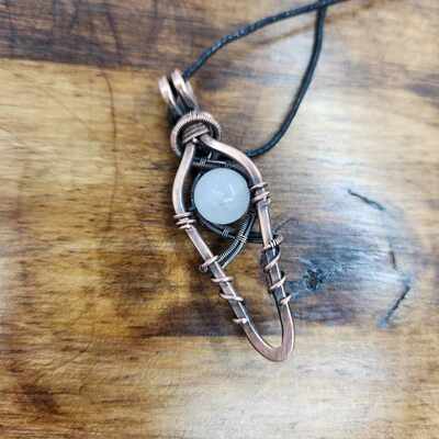 Elegant copper and quartz pendant
