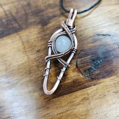 Elegant copper and quartz pendant