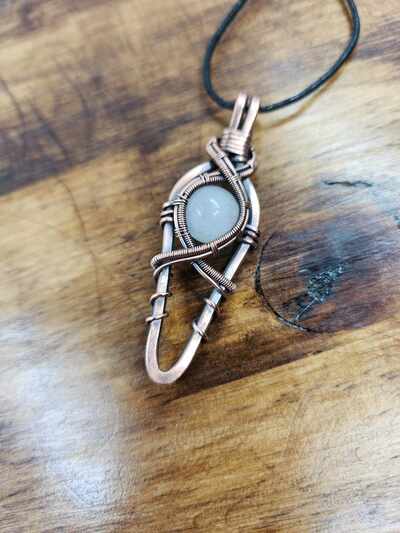 Elegant copper and quartz pendant