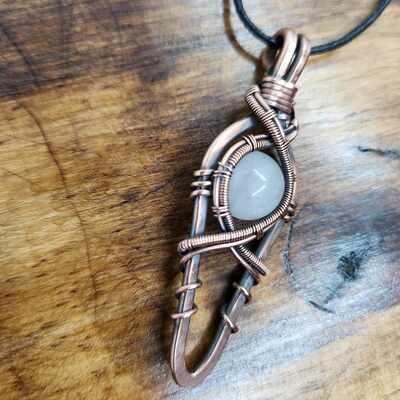 Elegant copper and quartz pendant