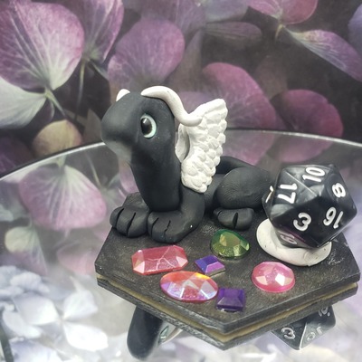 Black and white gemhoarder dice guardian