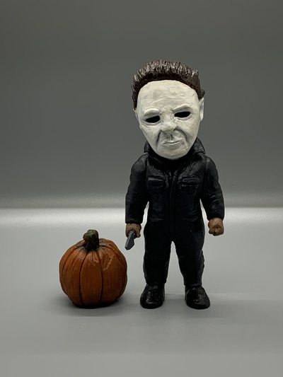 Dirty Mike Myers with knife and pumpkin 