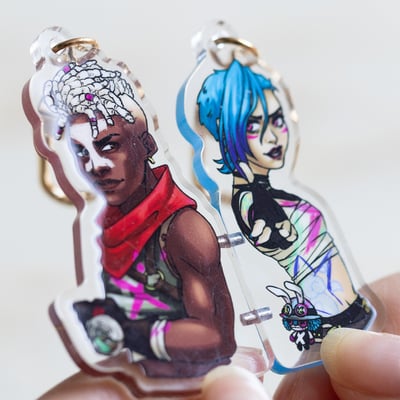 Arcane couple magnetic keychains