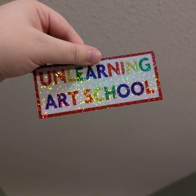 Unlearning art school glitter holographic sticker