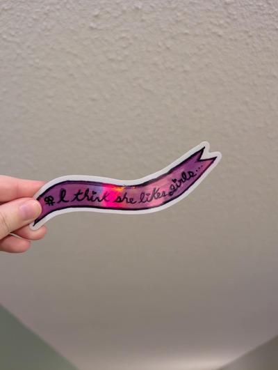 I think she likes girls metallic Sticker