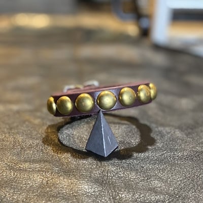 Brass dome-studs wristband