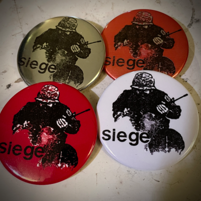Siege pin badge