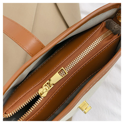 Women handheld bucket bag brown