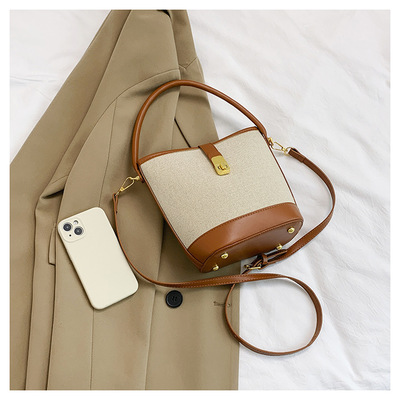 Women handheld bucket bag brown