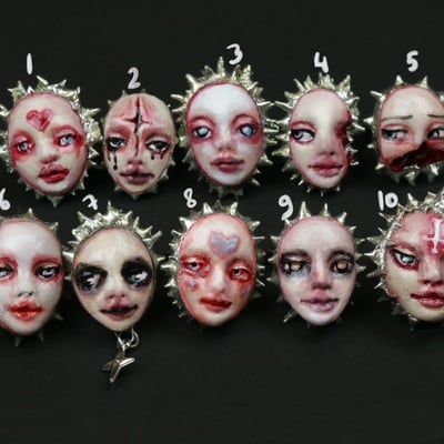 Adjustable doll face rings