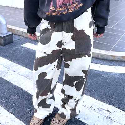 Mid rise cow print wide leg jeans 