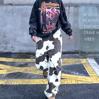 MID RISE COW PRINT WIDE LEG JEANS  - Thumbnail 1
