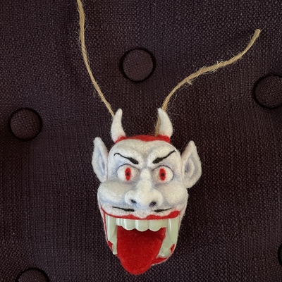 Devil man: glow-in-the-dark teeth