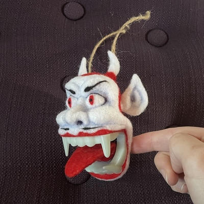 Devil man: glow-in-the-dark teeth