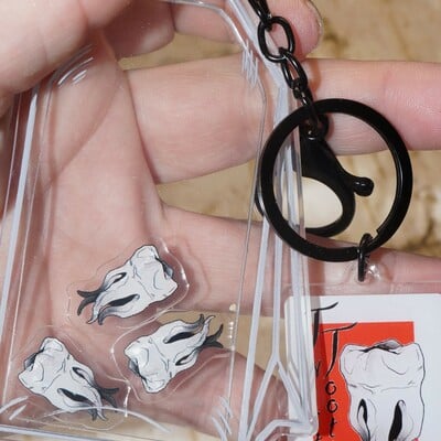 Twisted tooth shaker charms