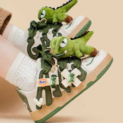 Cute skater shoes with plush dinosaur decor