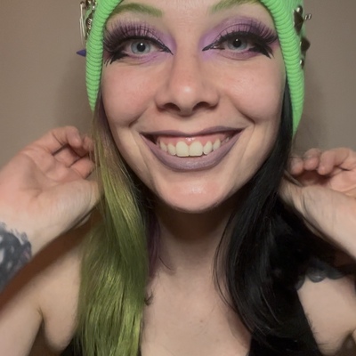 Green beanie with mixed metal embellishments 