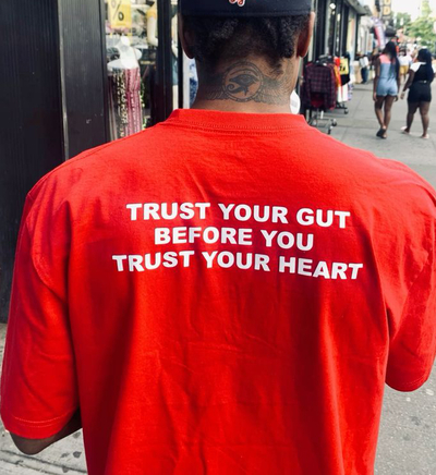 Free Shipping-TRUST YOUR GUT BEFORE YOU TRUST YOUR HEART TEE