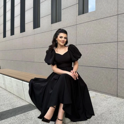 Vintage a-line black prom dress with puffy sleeves