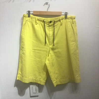 Dries Van Noten yellow shorts