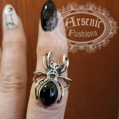 Silver spider poison ring