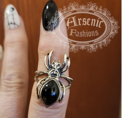 Silver spider poison ring