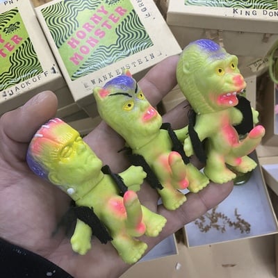 Horny monster - (hand painted green rubber with skull and crossbones denim  vest)