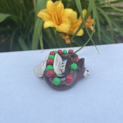 Dee the sleeping gingerbread dragon