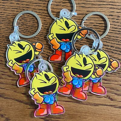 Packin’ man acrylic keychain