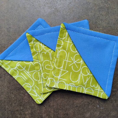 Corner bookmark- blue green letters