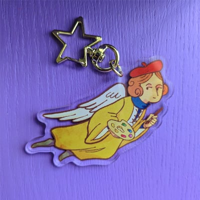 Angelic artist charm