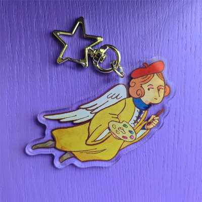 Angelic artist charm