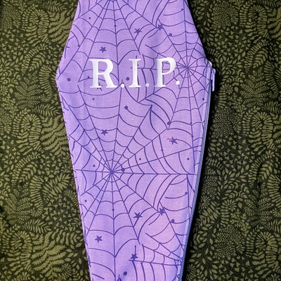Purple spider web coffin bag