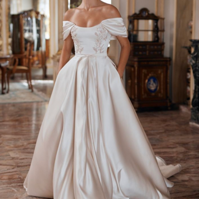 Vintage off-the-shoulder satin wedding dress with beading