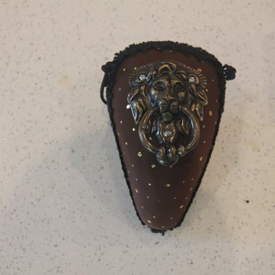 Lion's den knocker