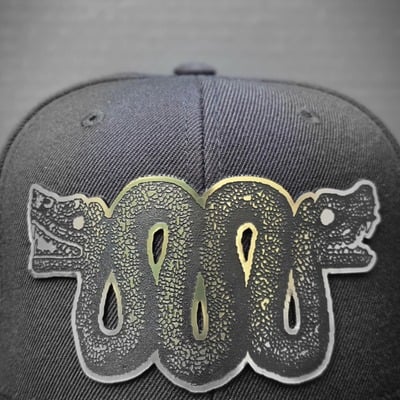 Serpiente bicéfala snapback